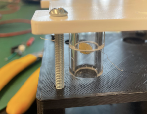 The final base and cap with the wrapped kernel and acrylic tubes inside